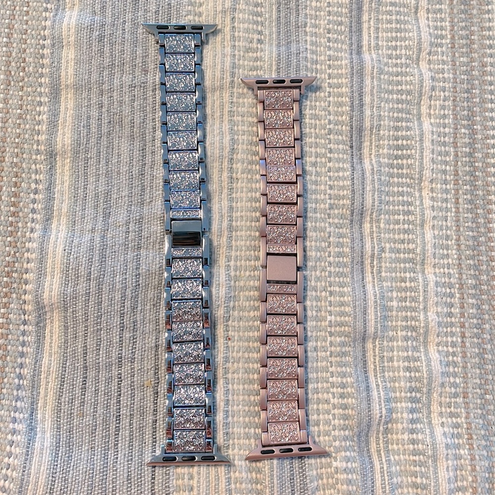 Two Apple Watch bands sparkly silver and sparkly pink